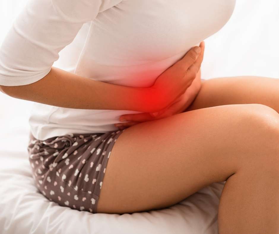 腹部疼痛是女性每個月都有的困擾之一（圖片來源：天一愛）