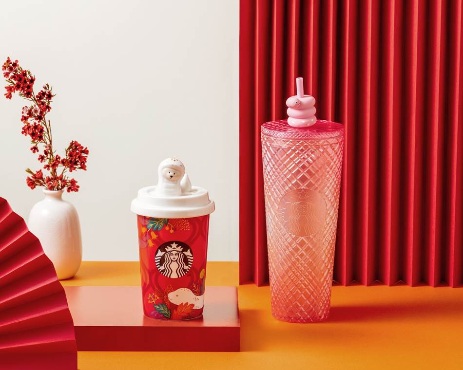 「24OZJeweled喜蛇TOGO冷水杯」(右);「蛇運亨通儲物罐」(左)。(圖:星巴克)